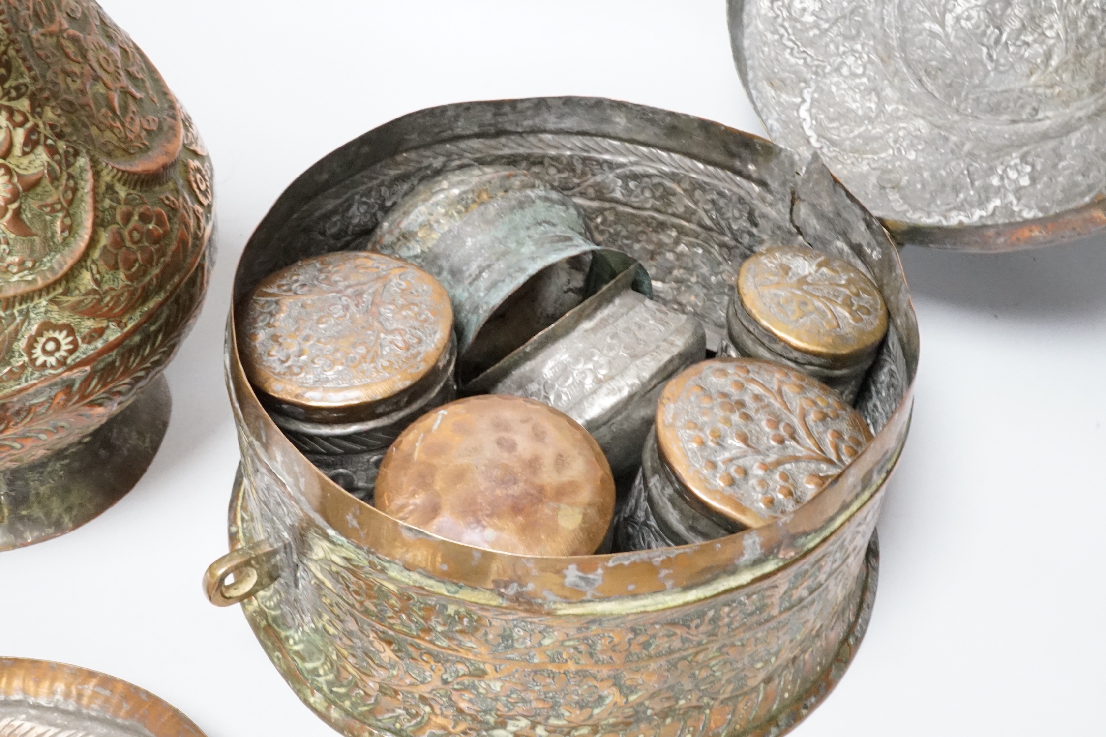 An Indian copper jug, various boxes and a tray, 26cm high